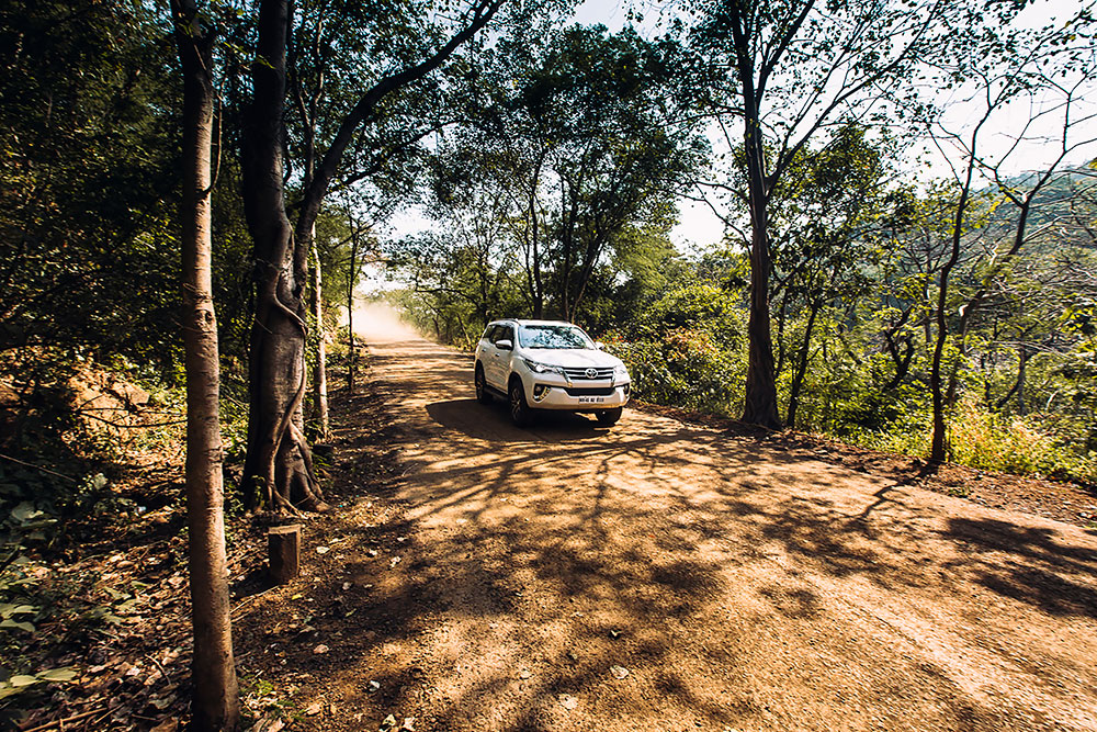 Toyota Fortuner Travel by Car Shreeji Travel Ahmedabad Sola